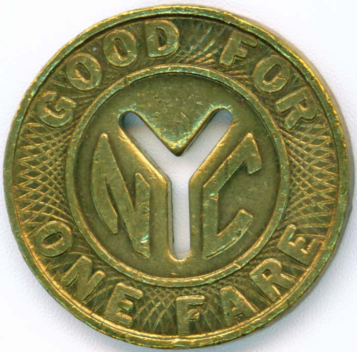 Reverse of a New York City transit token showing Good For One Fare